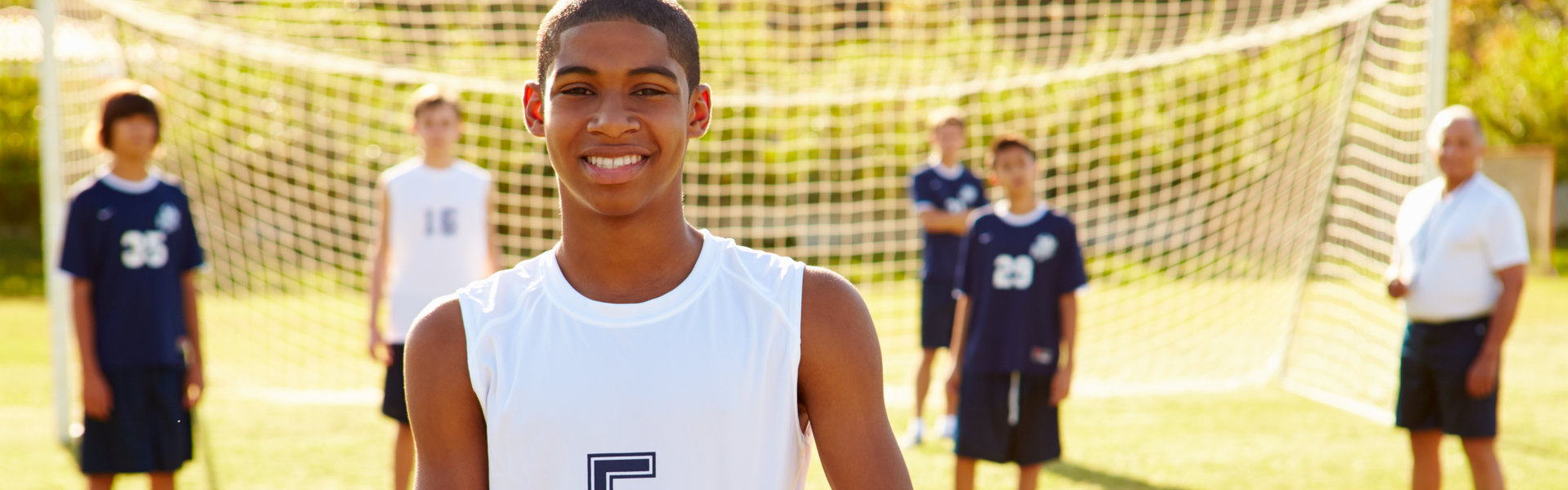 group of man in soccer field