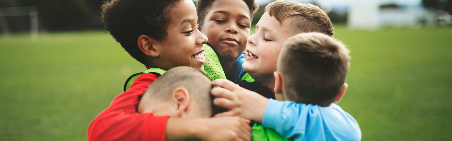 group of kids hugging